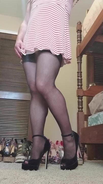 Crossdresser in heels and hose in slow motion.