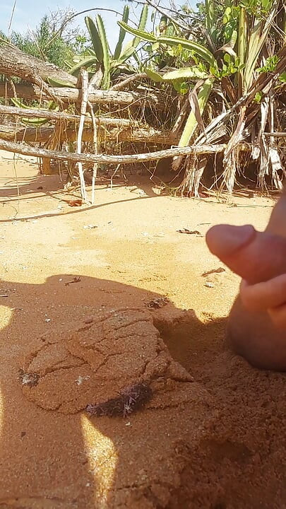 Ladysilva masturbating his cock on a deserted beach until he cums hot