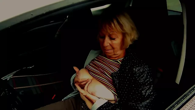 Granny show her tits in the car