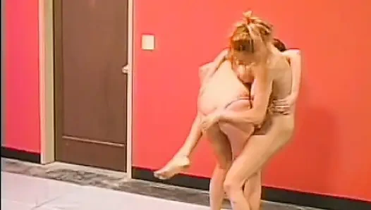 Big boobed ginger slut fucks a hot babe in the ring