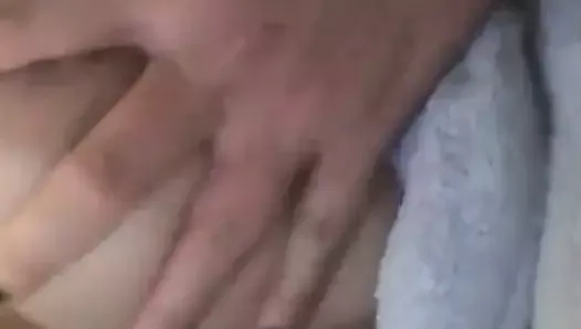 touching her own boobs
