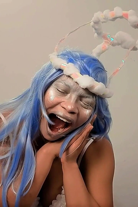 Angel Yawns Greatly Belly Fetish