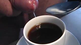Masturbazione del prepuzio del cazzo non tagliato di vetro del biscotto del caffè dello sperma
