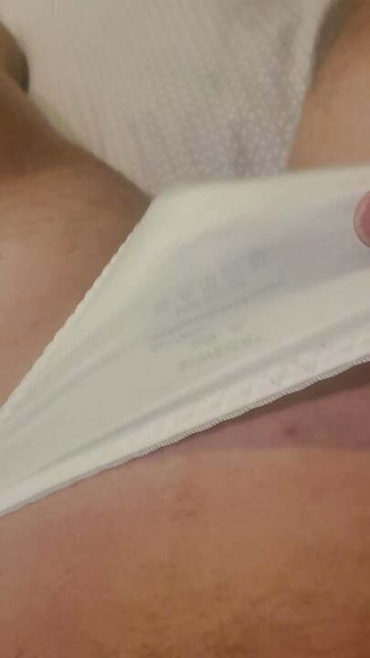 Sissy cums in his white satin panties.