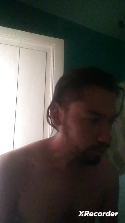 Man does his skincare in the morning