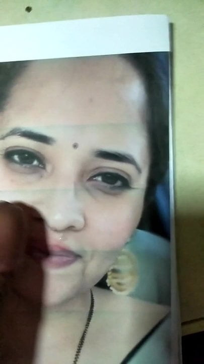 Actress Anusuya face rubbing