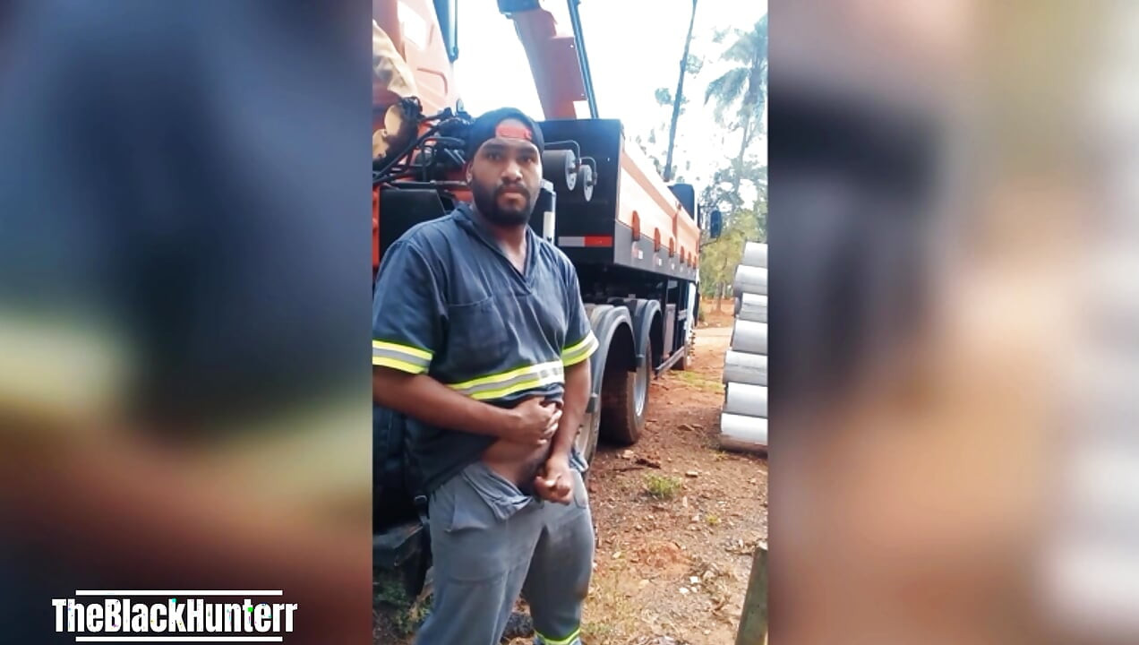 Worker Masturbating at the Construction Site Hidden Behind the Company Truck