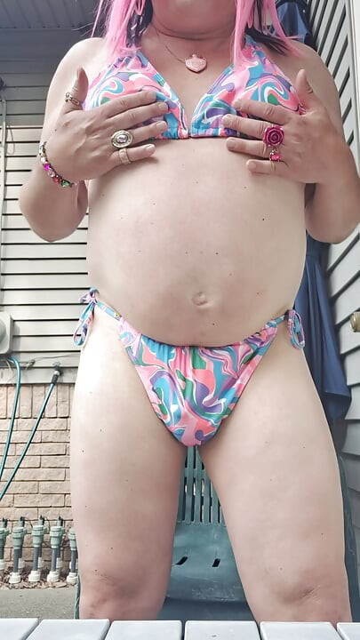 Feeling horny in my new bathing suit outside on the patio!