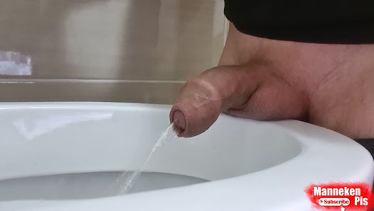 Boy pissing with uncircumcised cock