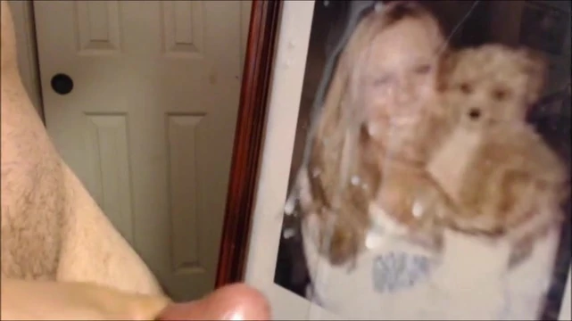 my girl's picture drenched in cum