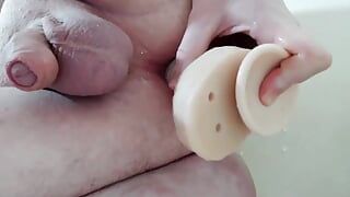 Cute guy diligently fucks his dildo hole and after fuck machine fucks him