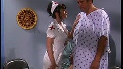 Slutty brunette nurse with big boobs in hot action