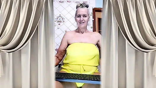 Cheerful Housewife Lukerya Shows Her Bare Feet in Kitchen. Mature Soles and Toes Close Up