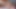 赤毛の女性が輝くピンクのドレスとヒールを履き、アナルと口で射精を受ける
