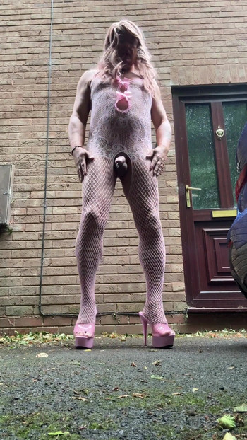 Memorable moment from "Sexy Crossdresser Kellycd2022 quick early morning video in pink fishnet bodysuit and heels"