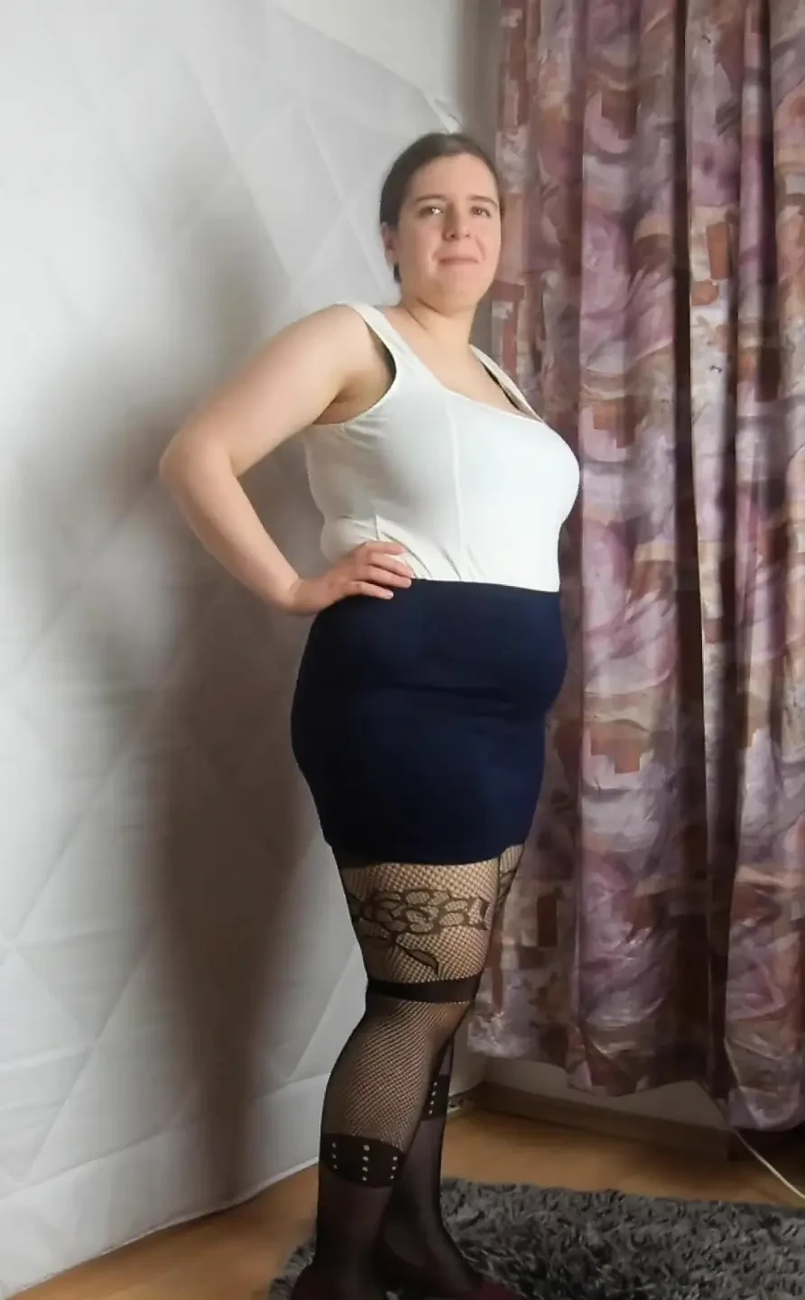 Mini skirt heels and fishnet stockings