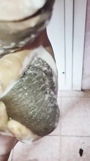 Captivating moment from "Doing handjob in the public washroom for the first time in Dubai"