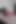 Pvc etekli ve külotlu çoraplı seksi kızıl saçlı poz