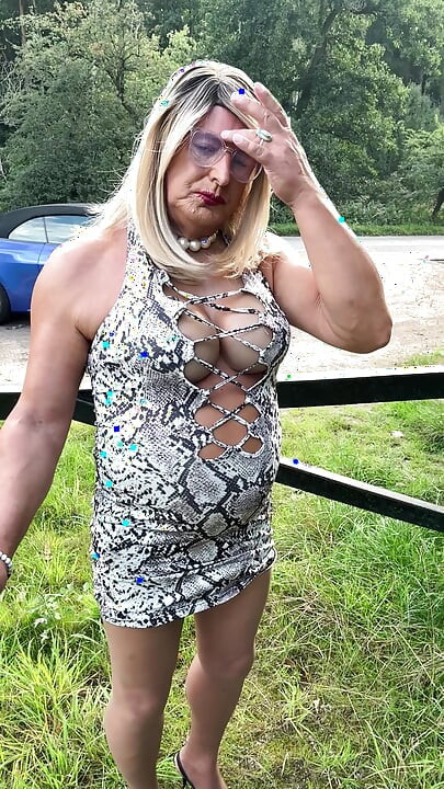 Sexy Crossdresser kellycd2022 in white animal print and pantyhose enjoying an afternoon drive