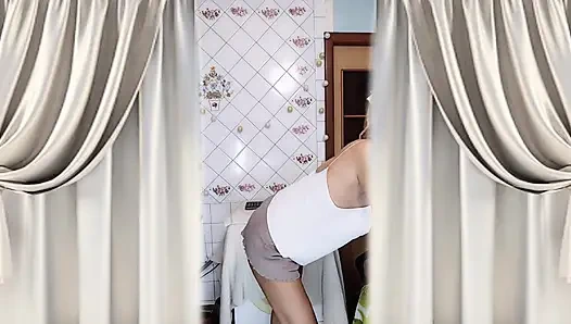 Old housewife Lukerya's morning flirtation involves brushing her teeth on the washing machine.