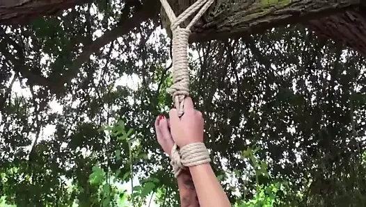 Stripped for a heavy outdoor whipping