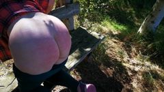 Spank my ass on the bench in the woods