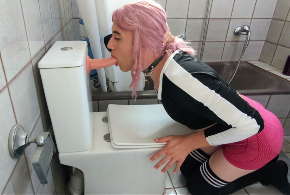 Sissy slut deepthroats dildo
