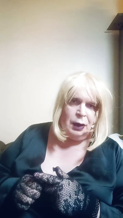 BBW TV smokes a superslim cigarette and tries on some gloves
