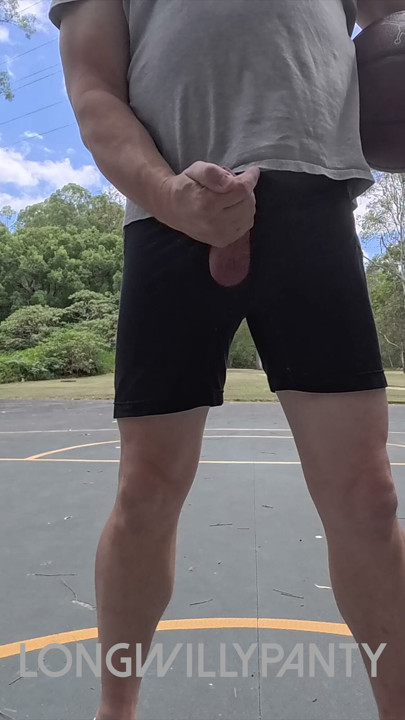 Straight guy hanging out his uncut cock at the public space.