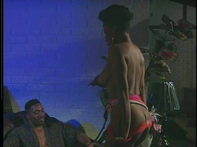 Stunning Ebony Hottie in Red Outfit Jeannie Pepper Needs to Wheedle Information Out of Famous Actor