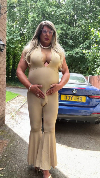 Emotional moment from "Sexy Crossdresser kellycd2022 in gold stretchy catsuit and heels"