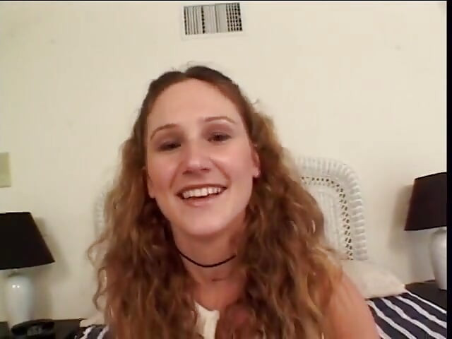 Young curly haired teen keeps her socks on