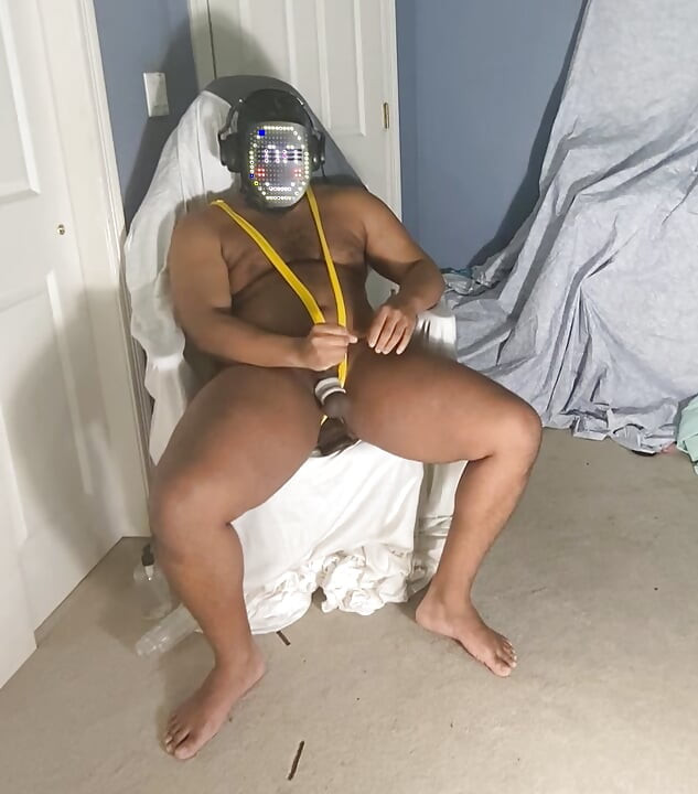 Masked Black Man In Mankini Stroking Out Cumshot With Fleshlight With Dildo In Ass
