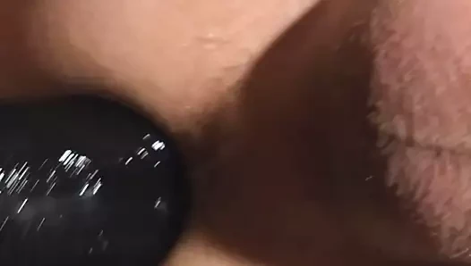 Horny little ass fucked by a huge black dildo and likes it