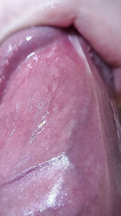 Close up cock head slow edging