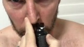 sexy man sniffing poppes