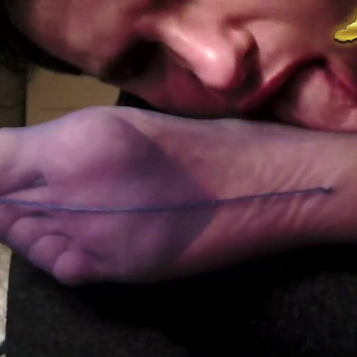 Trans is licking foot in pantyhose and masturbates