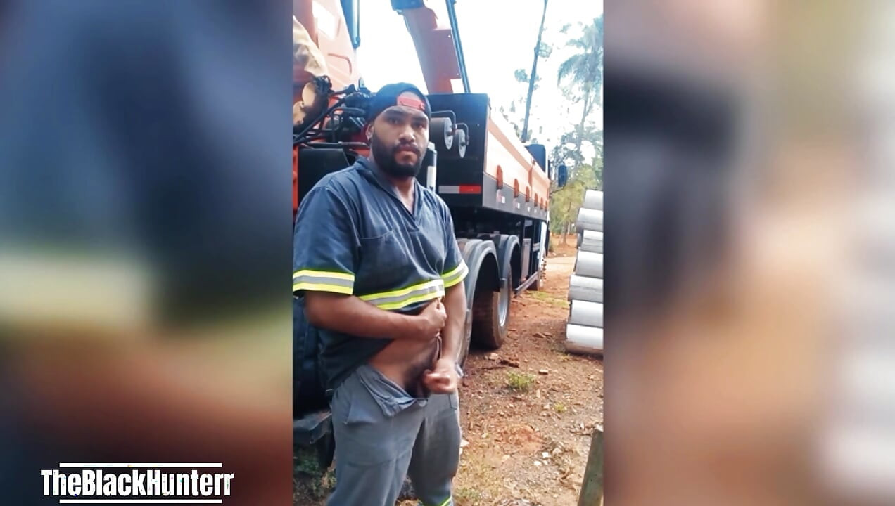 Worker Masturbating at the Construction Site Hidden Behind the Company Truck