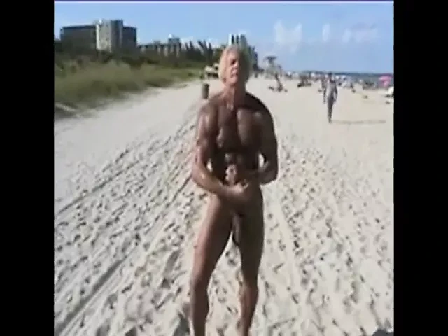 an older guy shows a big white cock to a nudist beach