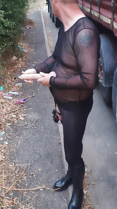 Cock locked sissy sucking dildo outdoors