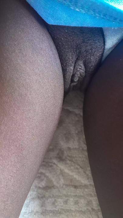 Hairy black pussy with long pussy lips