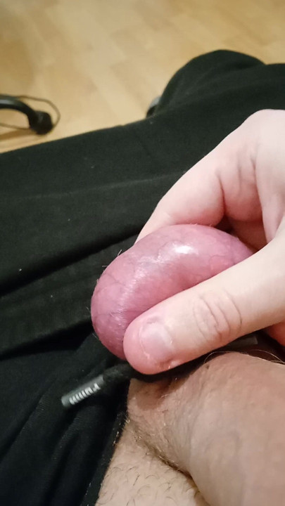 A young but very handsome gay with a plump dick is playing with him while his stepmom is washing in the shower