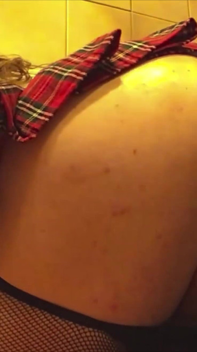 Unforgettable moment from "Young amateur femboy in schoolgirl skirt riding dildo against wall"