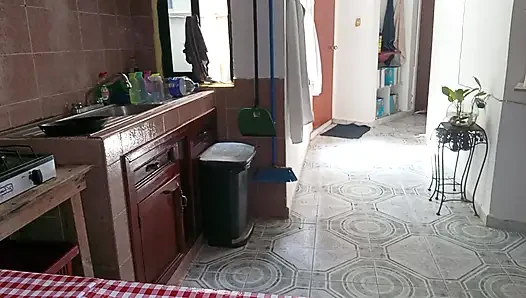 Mom in the kitchen in bralett