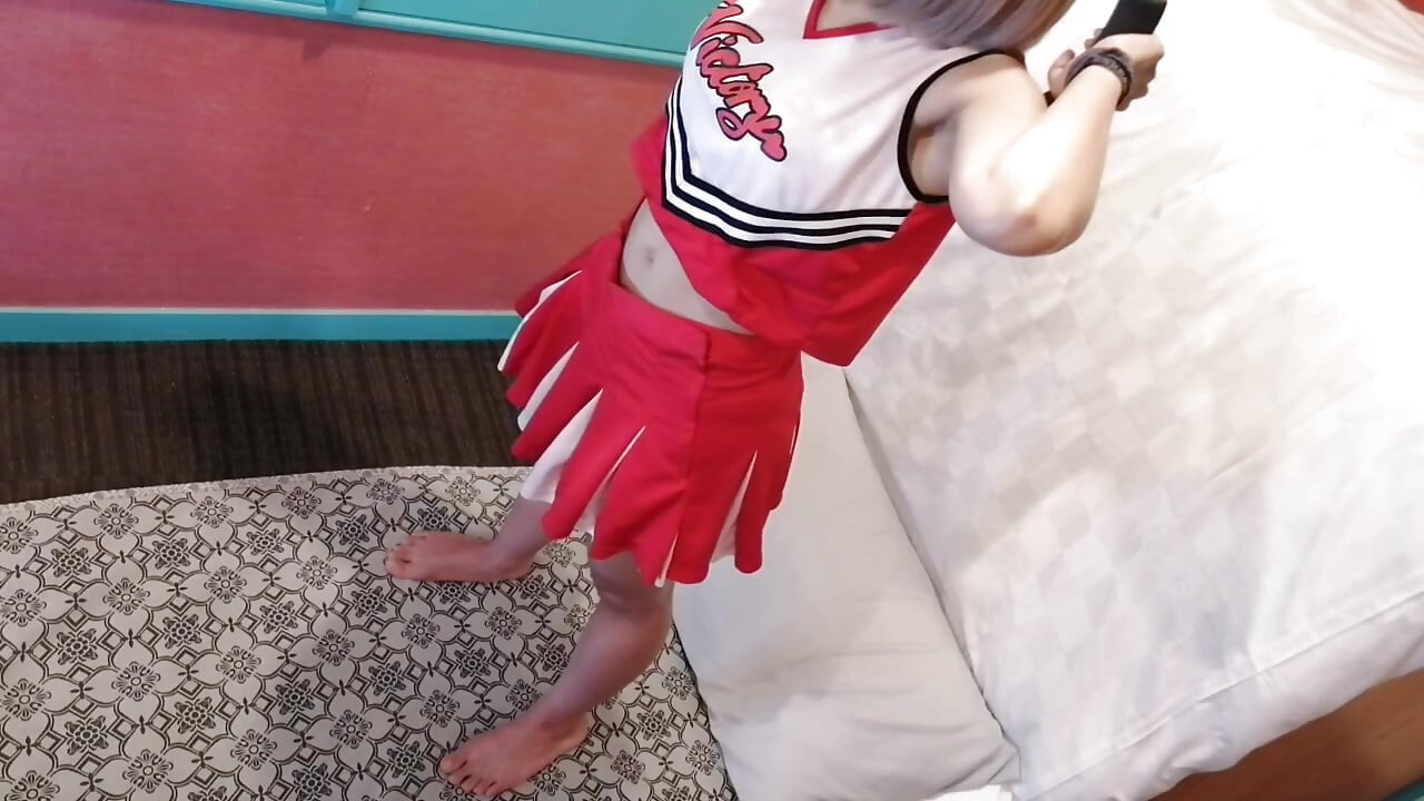 A cute, busty married woman performs exercise 4 in an erotic cheerleader costume. Peeking down from above. Home made amateur Private Shoot