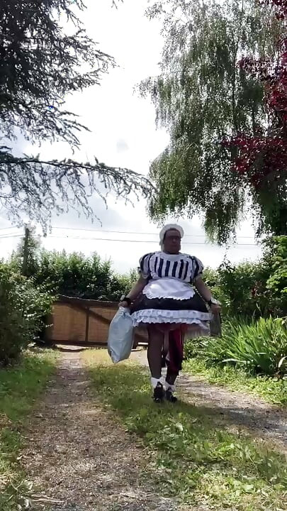In a black and white maid outfit for a day