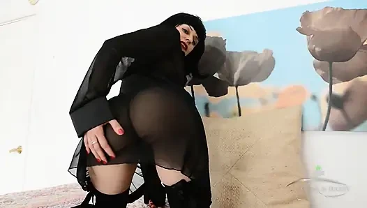 Andy Moon in black stockings, garters & high heels rubs her hairy pussy with big plump lips. Small tits bounce to moaning orgasm