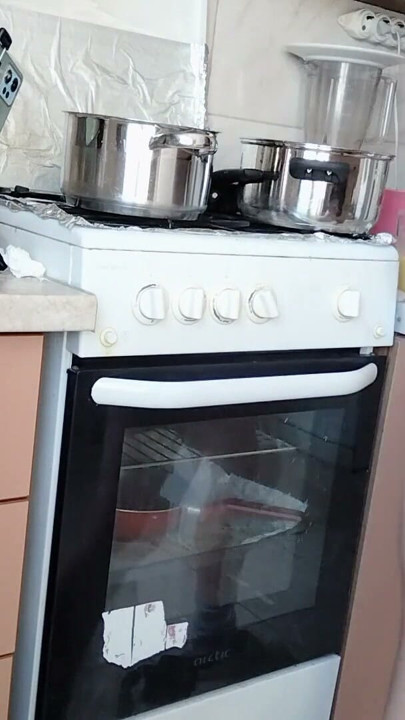 Sexy Latina nude in the kitchen. Sexy naked wife prepares food in the kitchen. | Clip 1