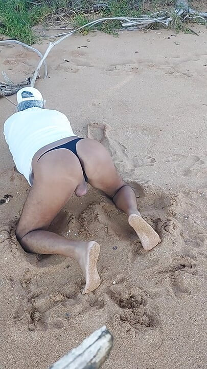 Ladysilva on the beach in panties showing off her sexy ass
