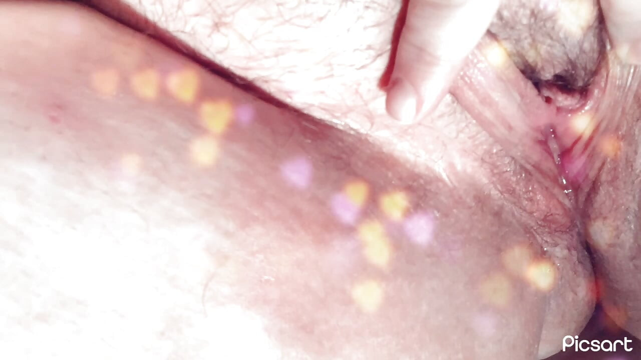 Beautiful shows off her hairy pink pussy